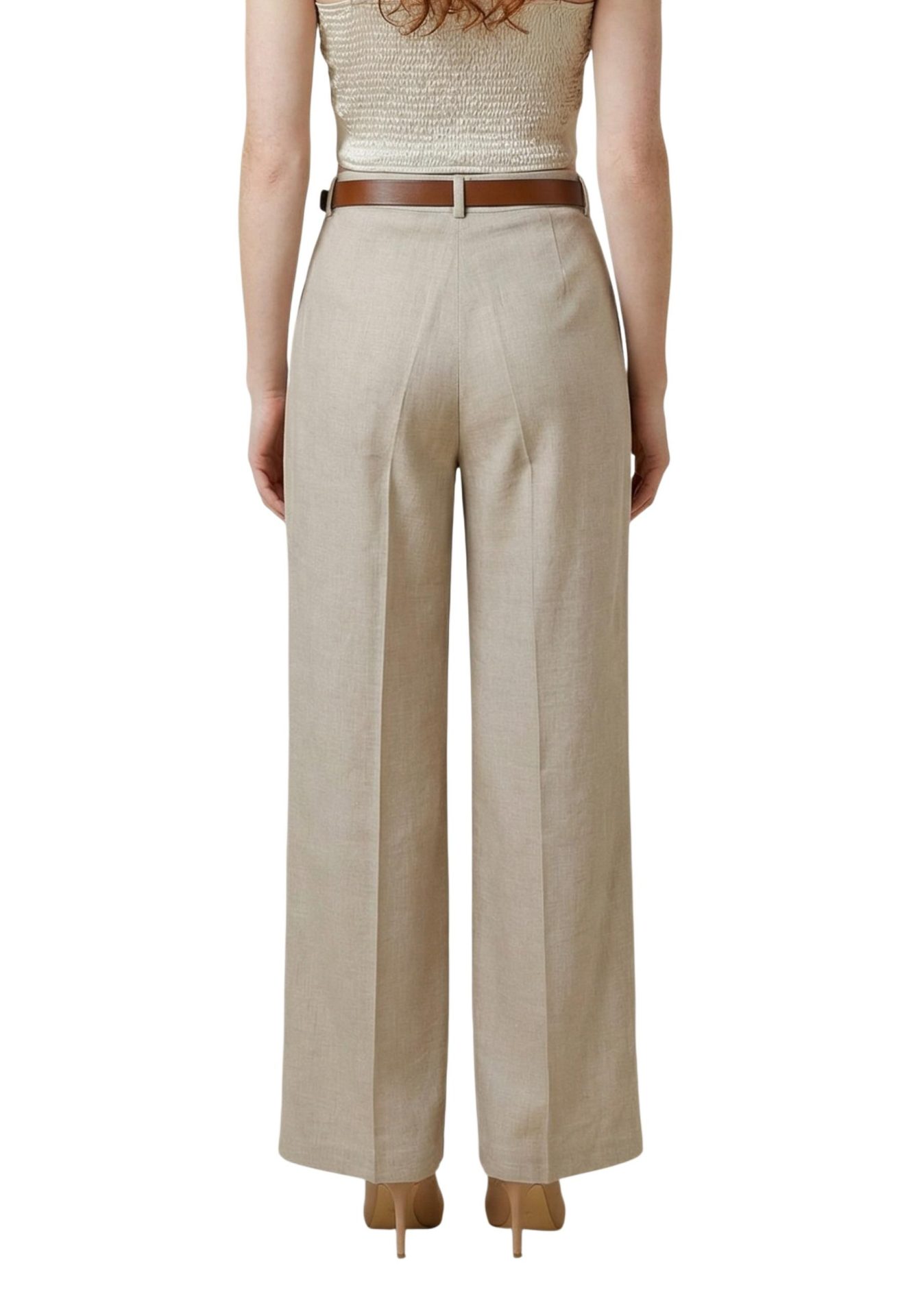 Rear view of a model wearing high-waisted, wide-leg beige trousers with a brown belt