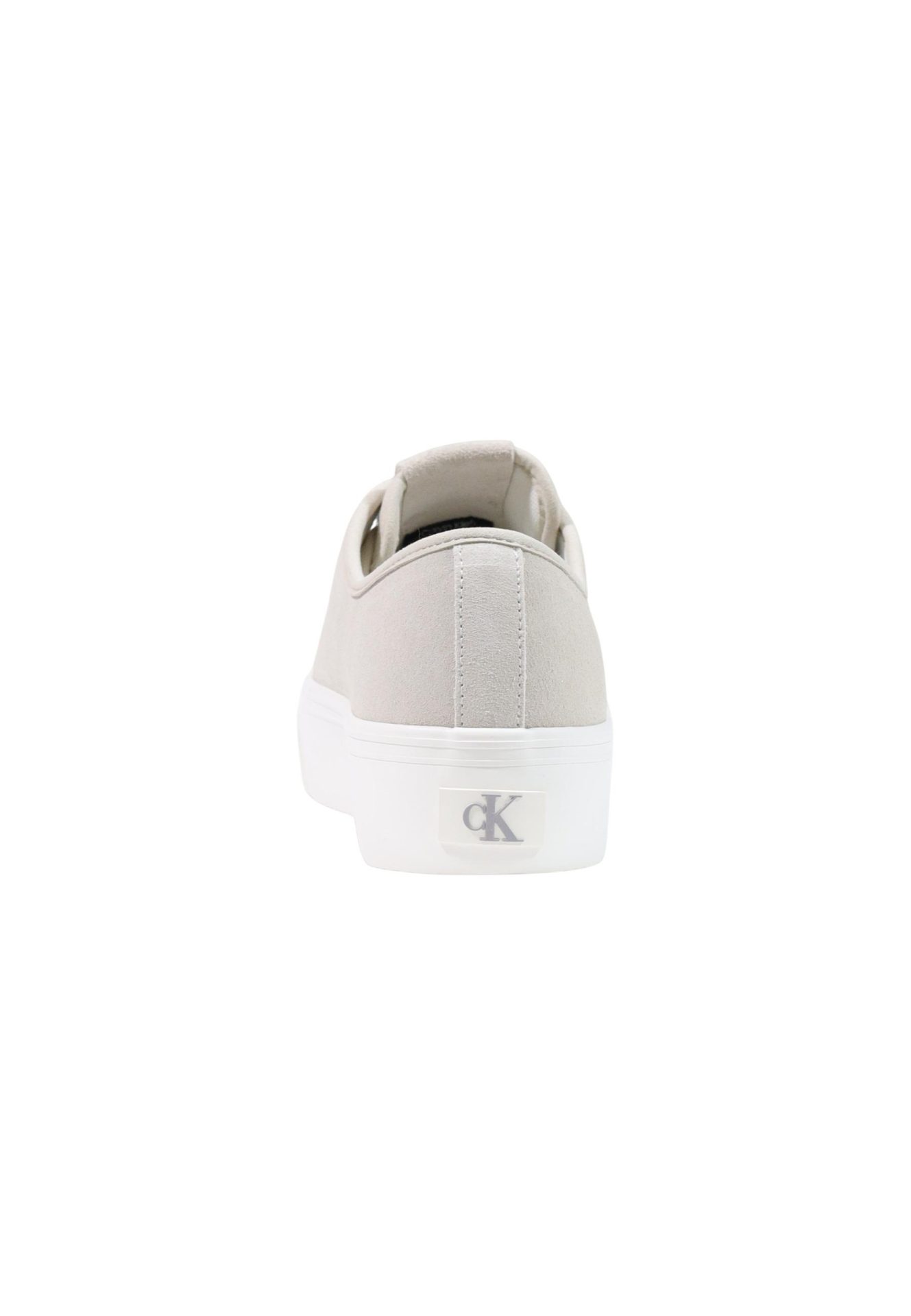 Back view of a light grey sneaker with a thick white sole and a silver cK logo on the heel