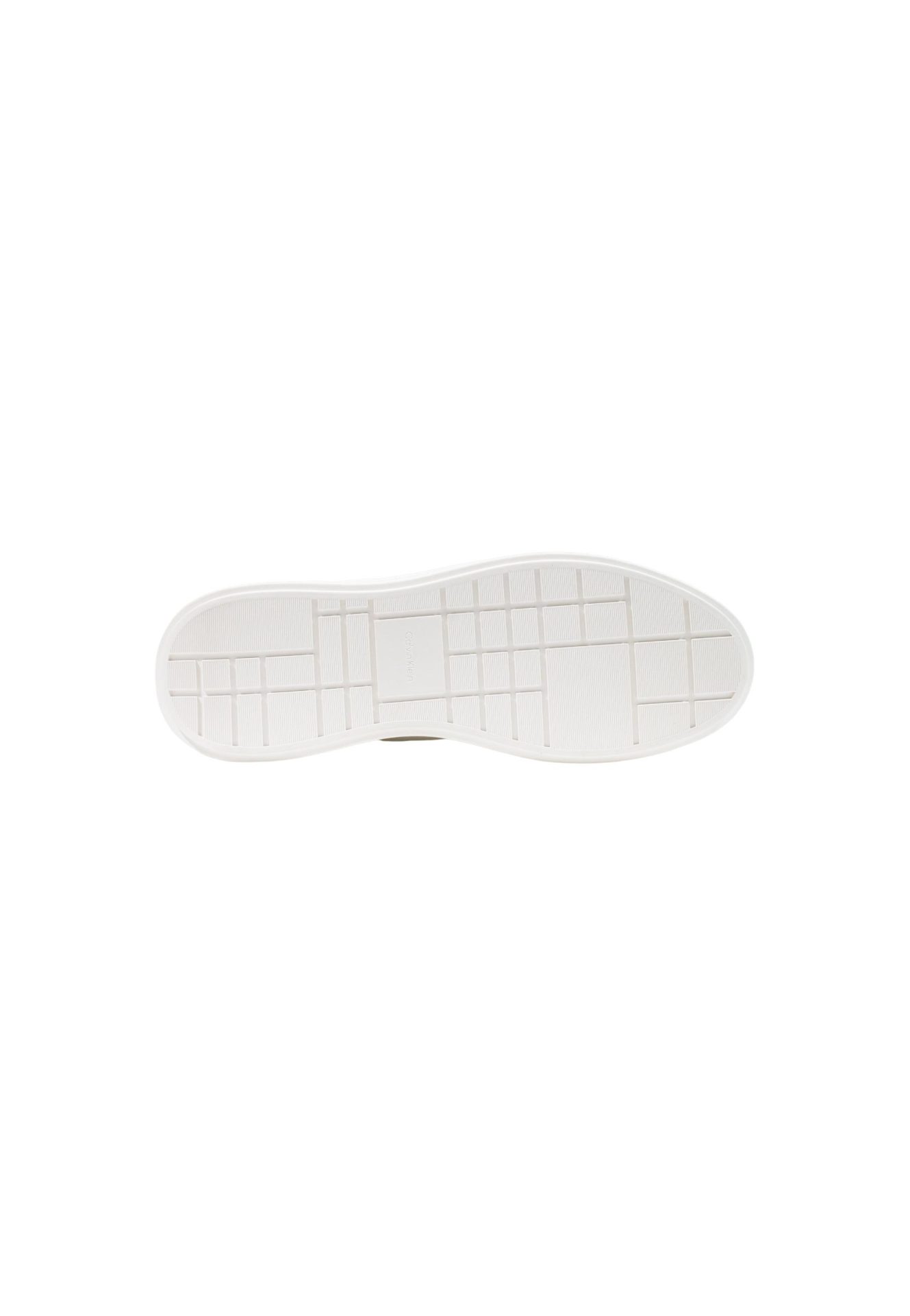 White shoe sole with a grid tread pattern and Calvin Klein logo in the center